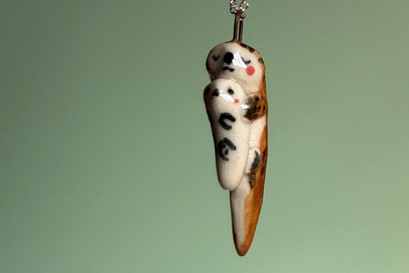 Alternative view of Pendant - Otter and Pup