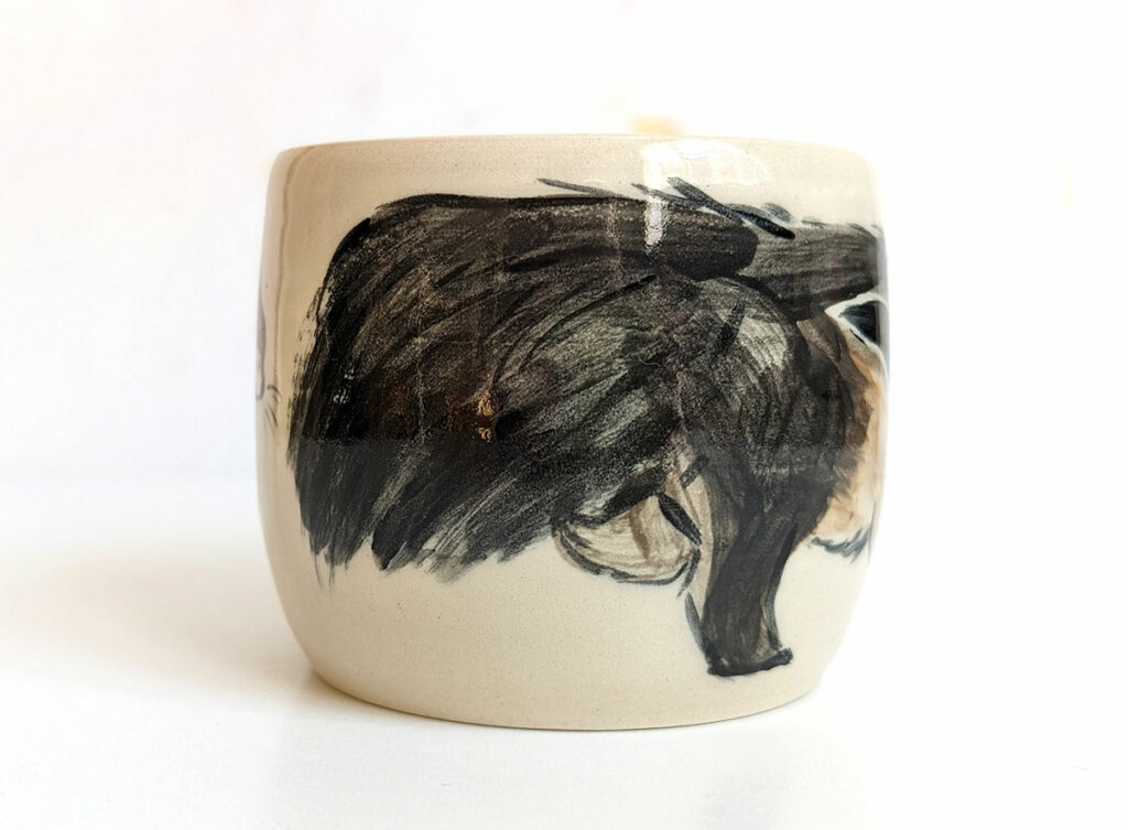 ant eater and otter mug