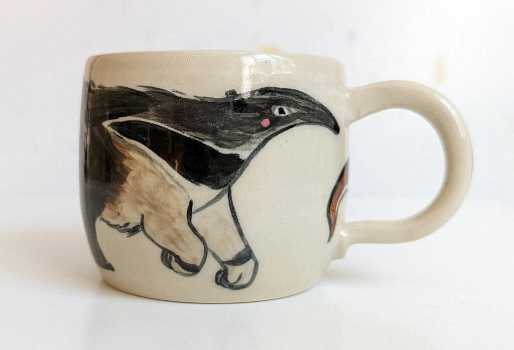 ant eater and otter mug