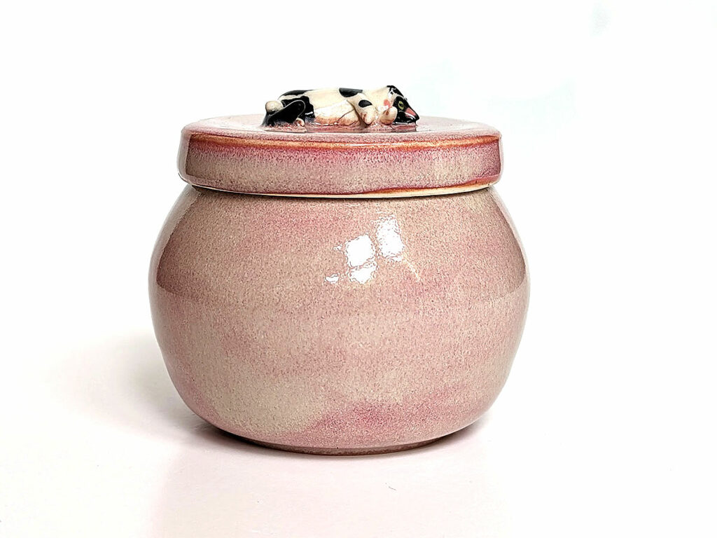 custom powder pink urn for a tux kitty