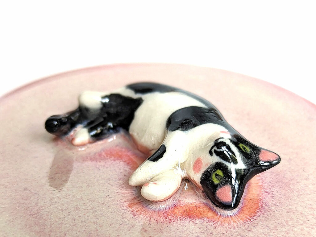 custom pink urn for a tuxedo cat