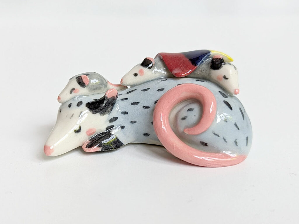 opossum family figurine