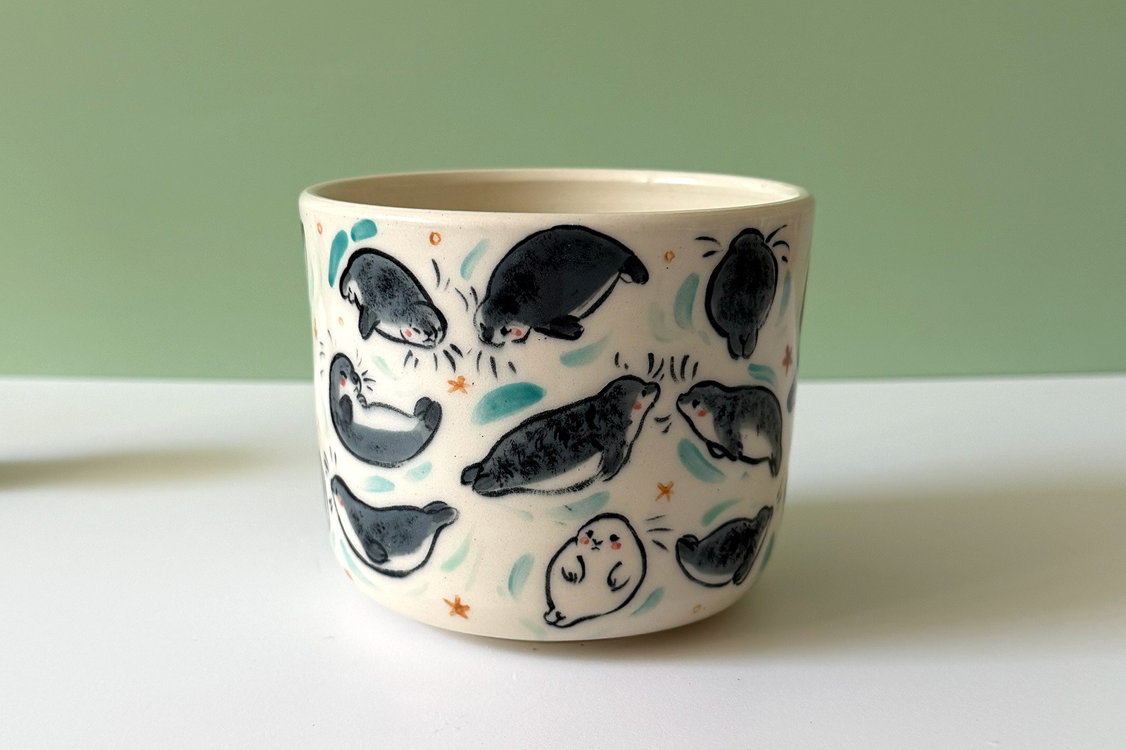 Cup - Many Seals