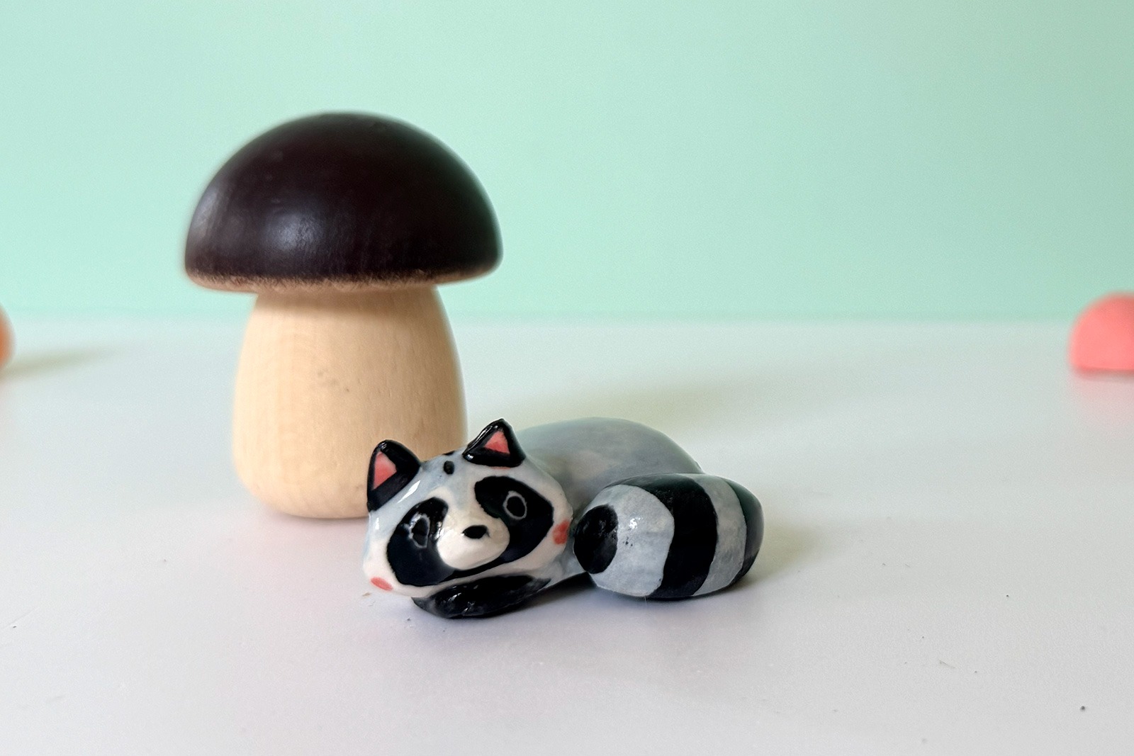 Porcelain Figurine - Sleepy Raccoon